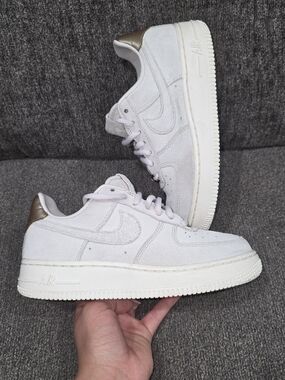Nike White Suede Low-Top Sneakers with Metallic Bronze Heel
